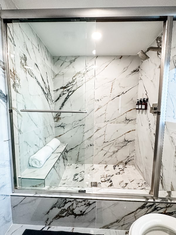 Second full bath attached to the bedroom with queen bed
