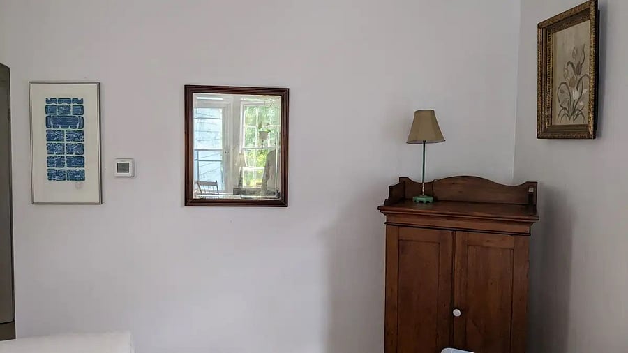Another view of sitting area with backyard garden view in second floor flat.