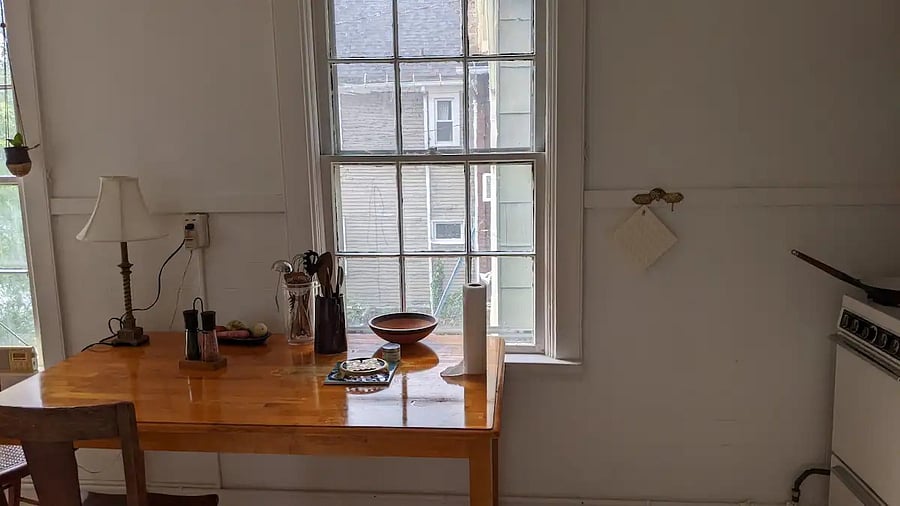 Eating area with garden view in second floor flat.