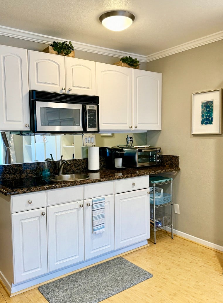 2 burner stovetop, microwave, Kuerig single cup coffee maker, versatile toaster oven make cooking a cinch