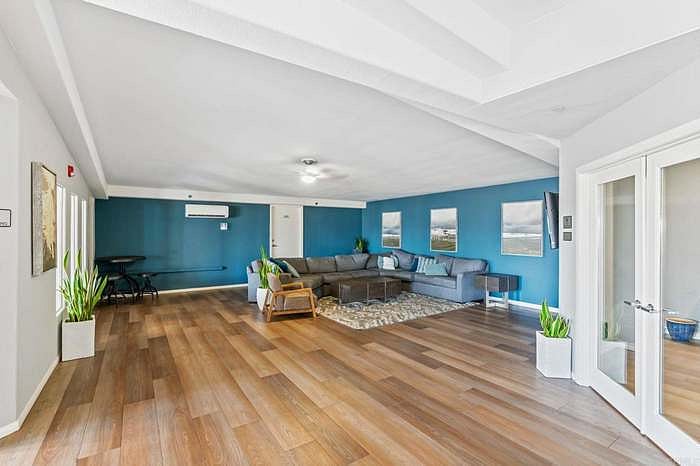Entertain in the lounge area with sectional seating and TV