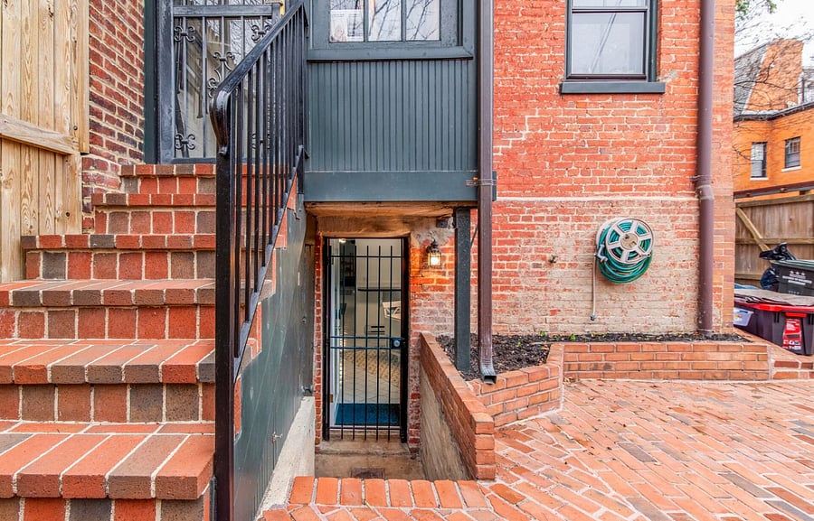 The entrance to the apartment, down the stairs.
