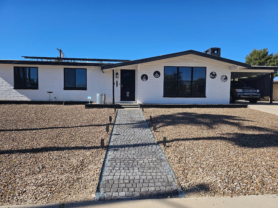 Front of home with driveway showing