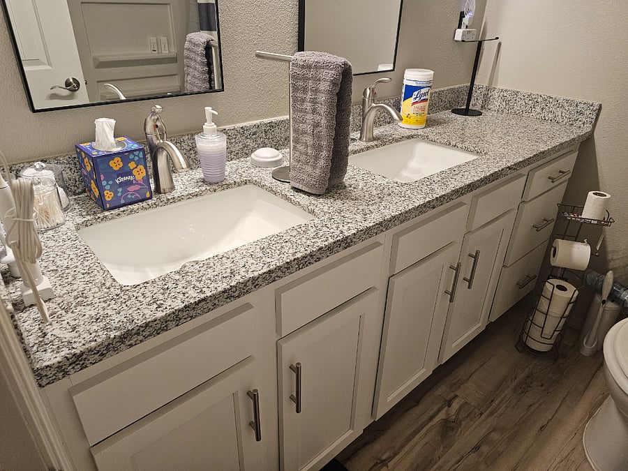 Shared bathroom dual sink plenty of storage under sink and first aid kits, USB adaptive plugs on both sinks