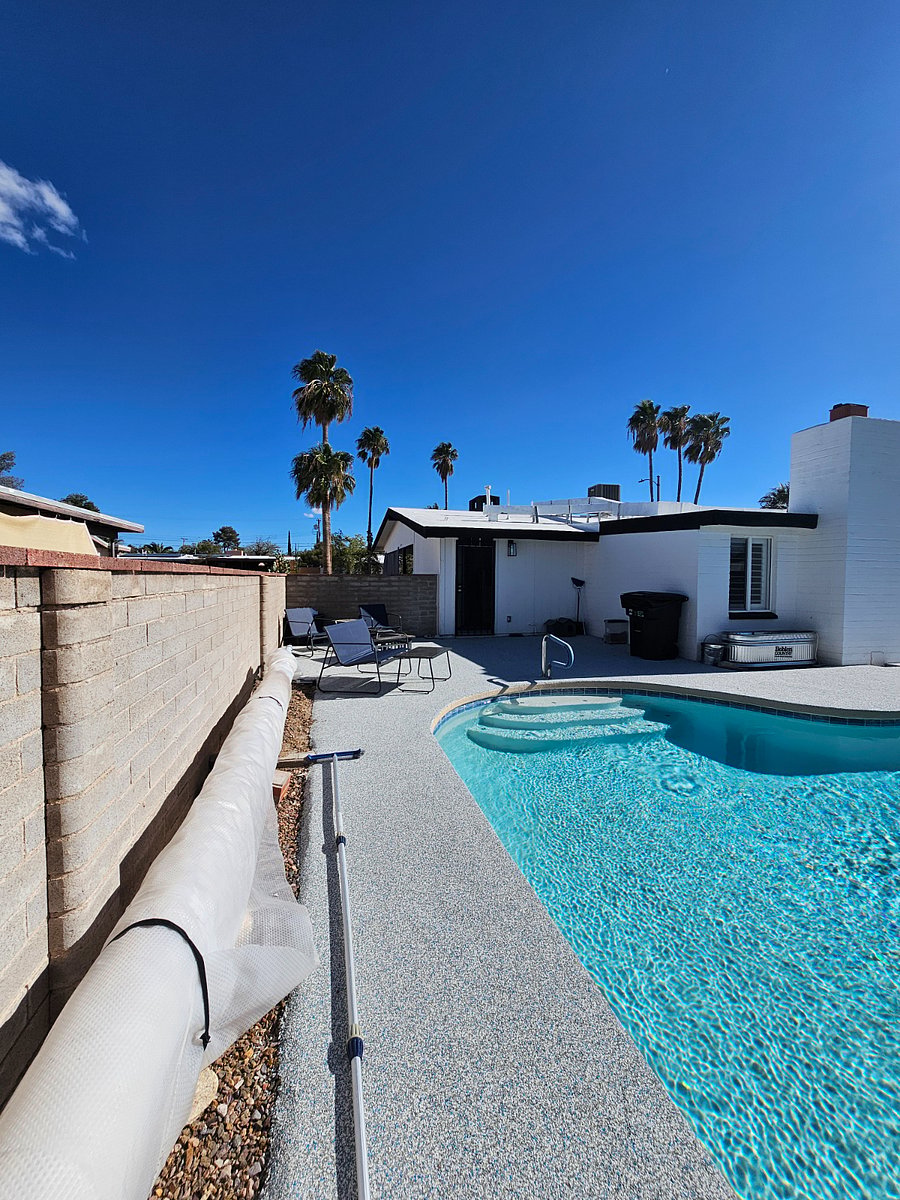 Pool with view of backdoor entrance