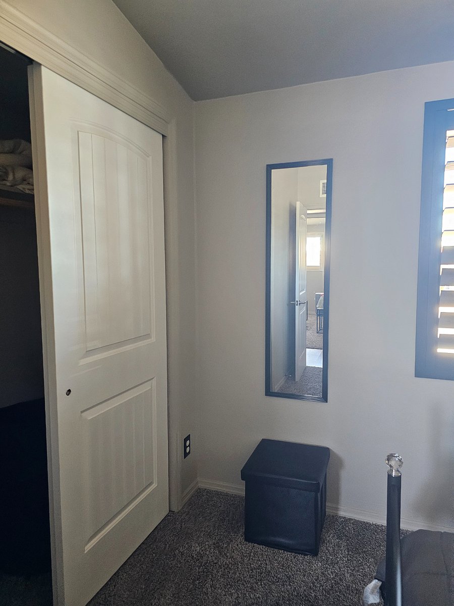 Full bedroom closet/mirror/storage ottoman