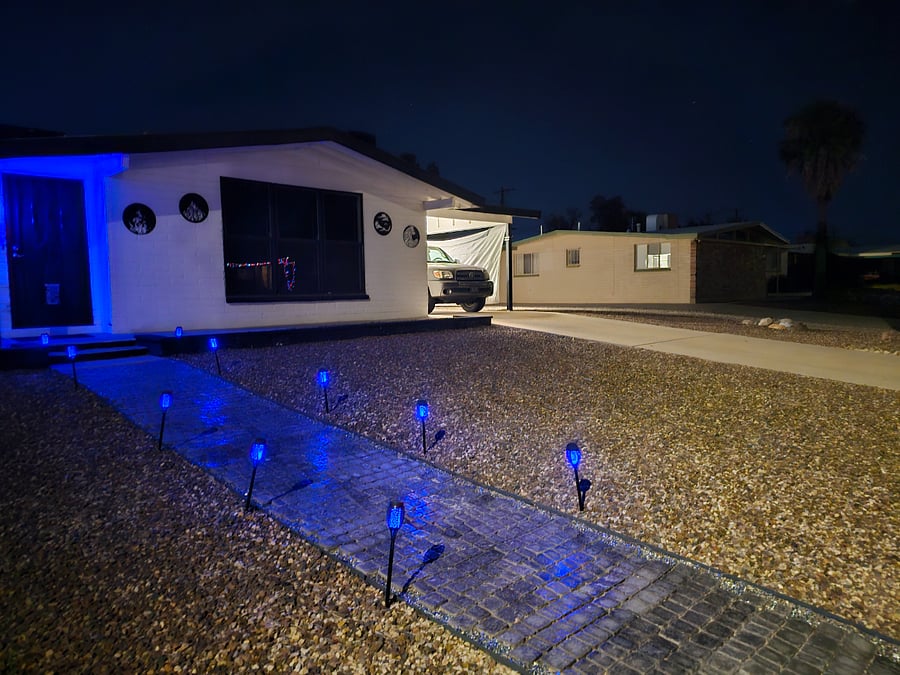 Walk path lighted for entry, carport and room for up to 4 vehicles.
