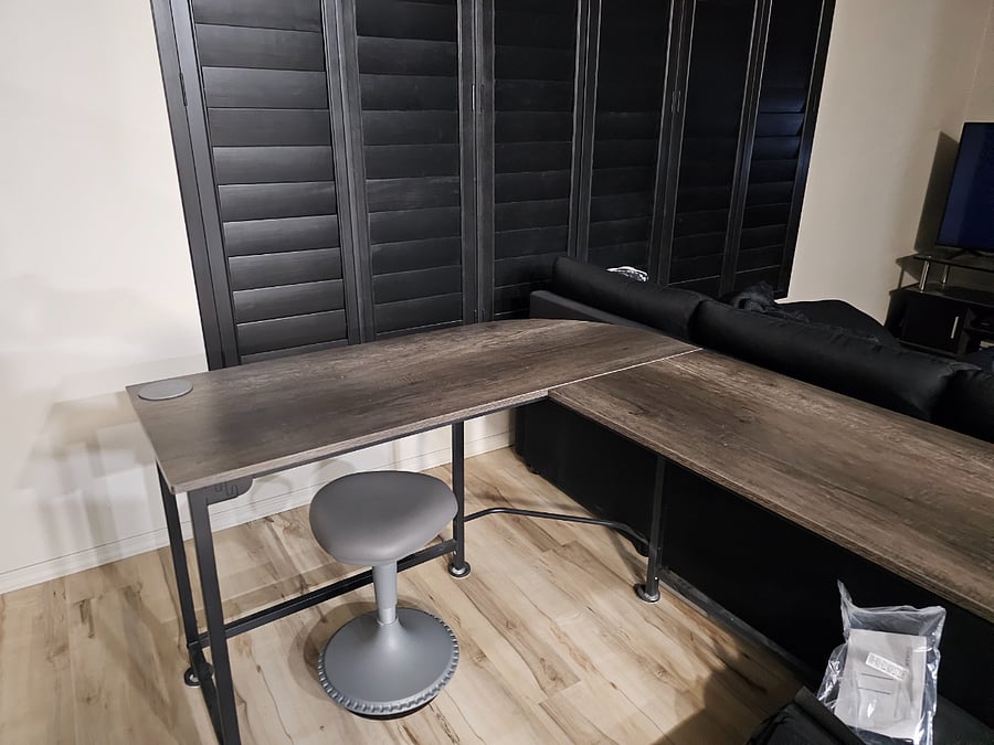 Front family/tv room, desk for study, and fold out couch for queen sleep