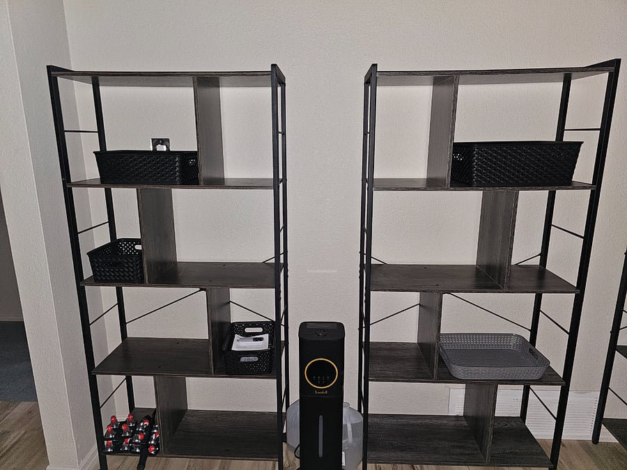 Front family/tv room bookshelves and full house humidifier.