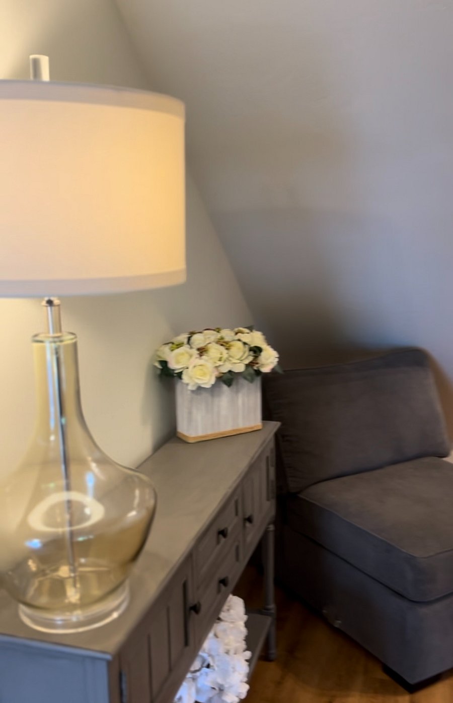 Under stairway nook, perfect for office work or reading area.