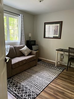 Woodland Travelers Lodging - Private Wolf Unit also private 2nd room TV activity room with mini fridge freezer, microwave, TV, desk for laptop work station. This private space in addition to the common areas.