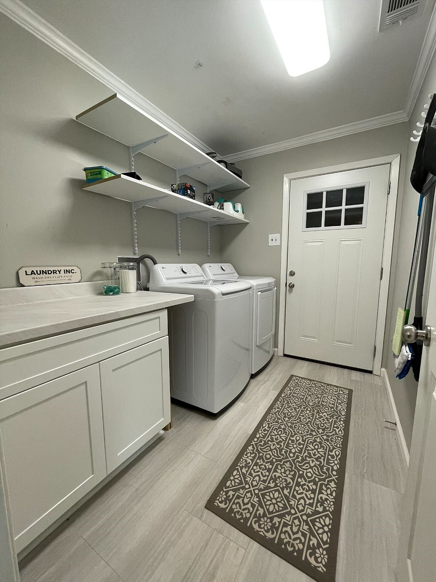 Brand new laundry area with folding area.