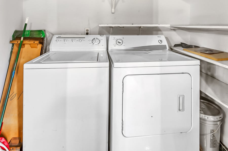 washer and dryer by kitchen area