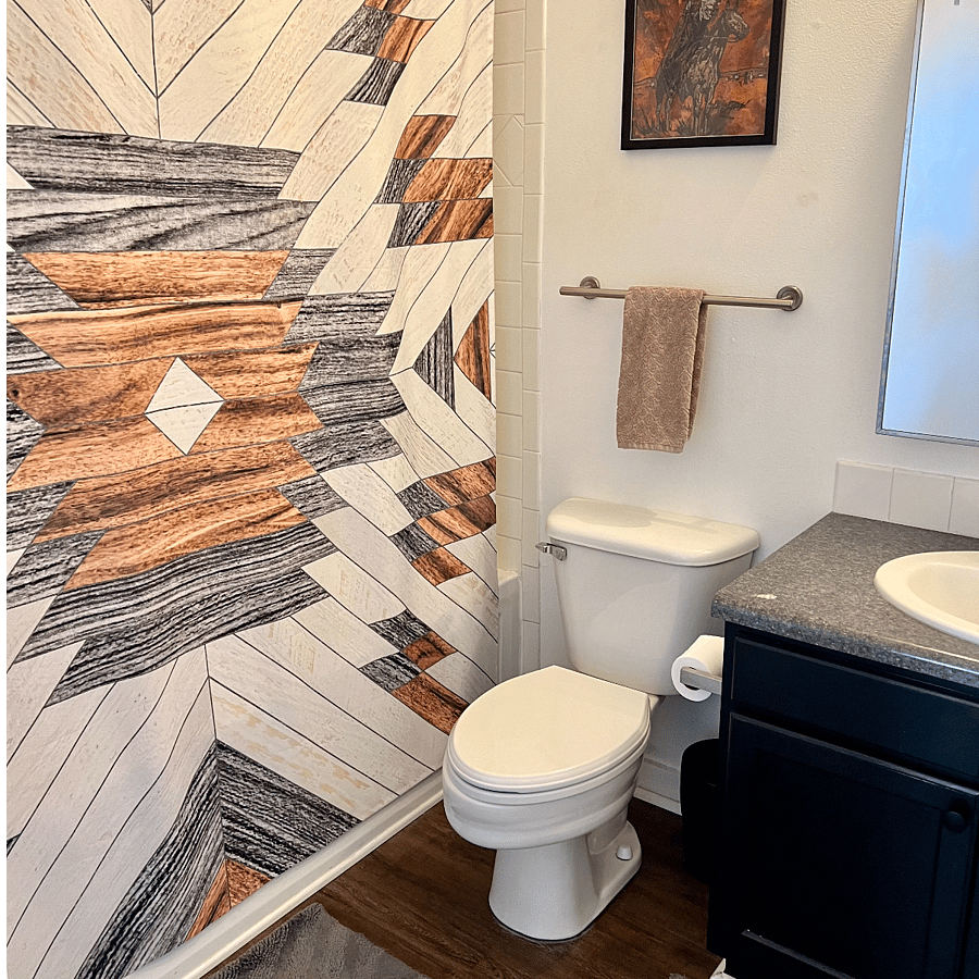 Bathroom includes large bathtub/shower