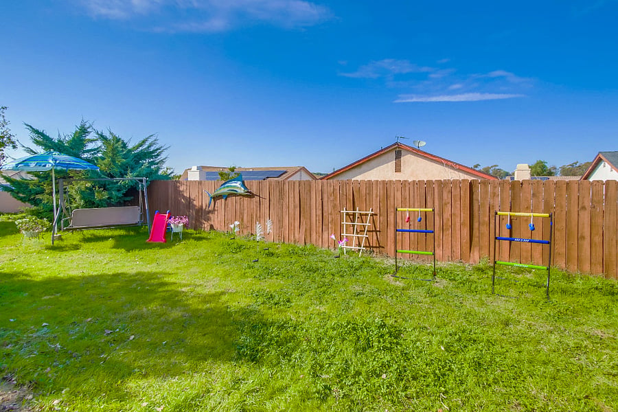 Let your kids and pets run around under the sun in this spacious yard w/ natural grass