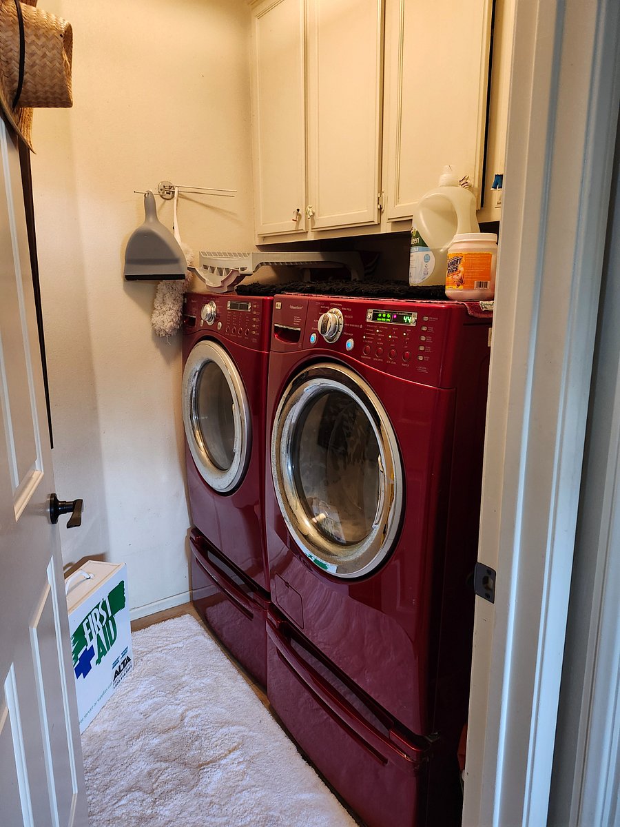 Heavy duty washer/Dryer off bathroom, with first aid kit.