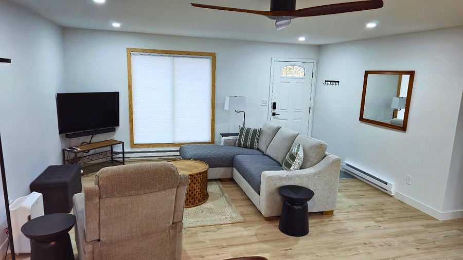Light filtering top down/bottom up shades. Side tables, coffee table and coat hooks.