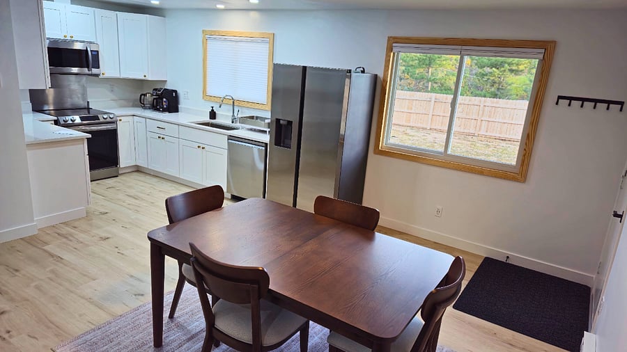 Full size dinner table. Seating for six with cushioned chairs. ( 4 chairs shown, 6 available)