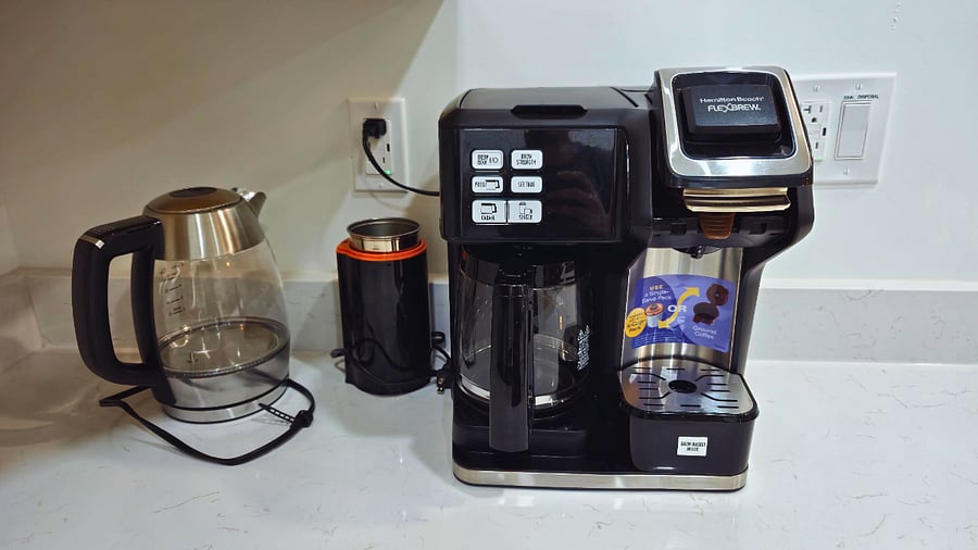 A coffee lovers dream! 3-in-1 coffee maker for a full pot, K-pods, or your own ground coffee. Plus, a coffee grinder and hot water kettle for the perfect brew!