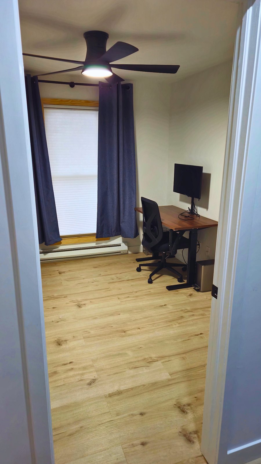 Bedroom 3 is setup as a home office/bedroom with adjustable height desk, office chair and external monitor to connect to your laptop via HDMI cable. There is high speed wired or wireless internet. Full closest organizer clothing storage.
