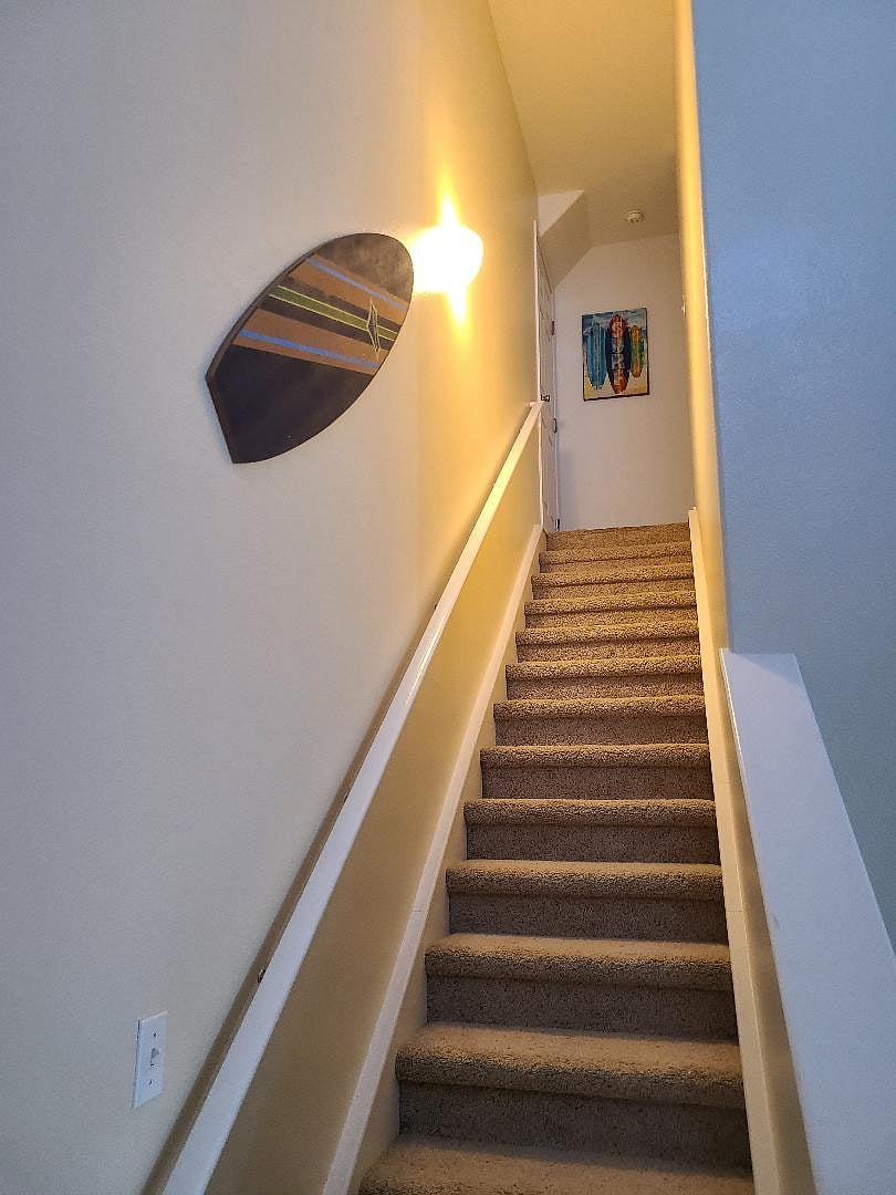 stairs to upper bedroom & private bath.