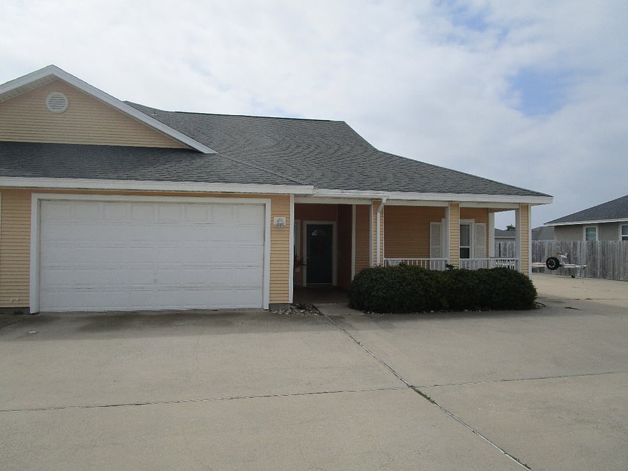 front of the home/ porch/2 car attached garage