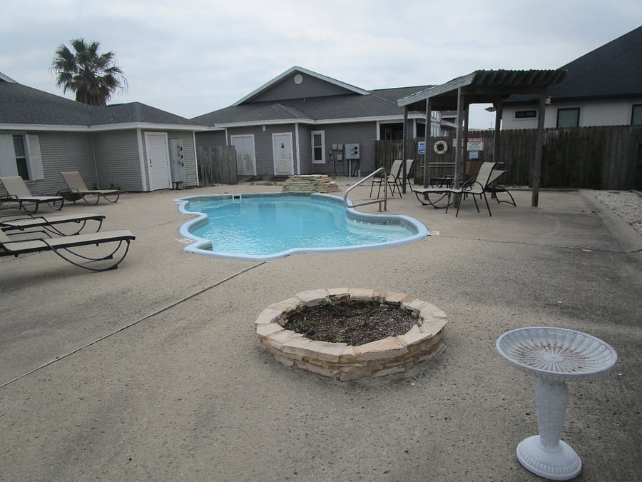 Great pool; sitting area; fire pit and tables. 