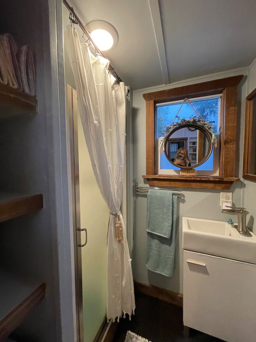 Bathroom, sink, shower and mirror