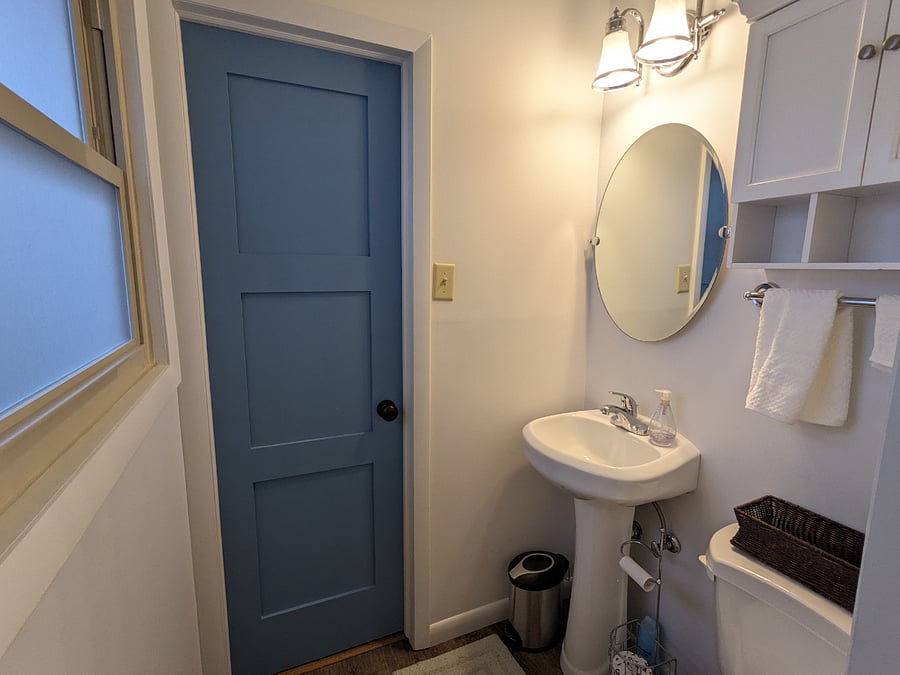 Half bathroom off of main bedroom. Door leads to bedroom