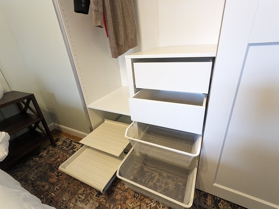 Left side of main bedroom closet