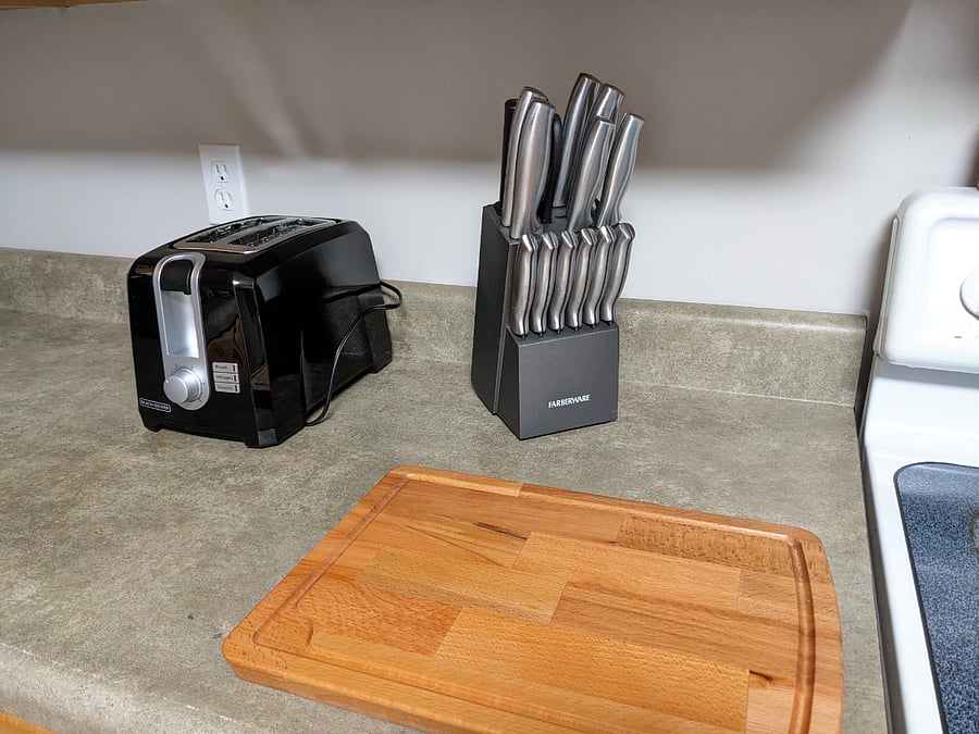 Other appliances include an air fryer, hand mixer, blender, coffee maker, toaster