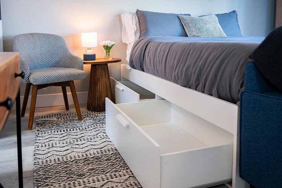 4 large drawers surrounding bed for storage.