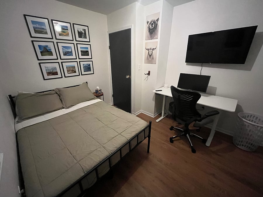 Bedroom 2 (full bed) facing the hallway door. 42 tv and standing desk included.