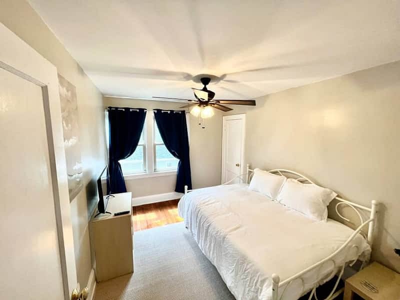 Private Bedroom Suite 2 with full size bed, smart tv, and lots of windows!