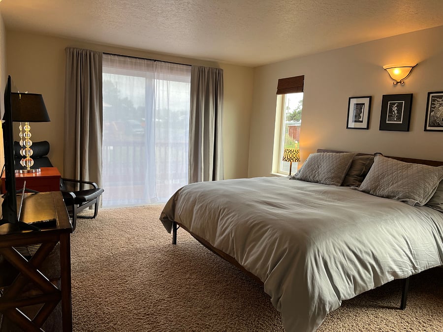 master bedroom with balcony looking east