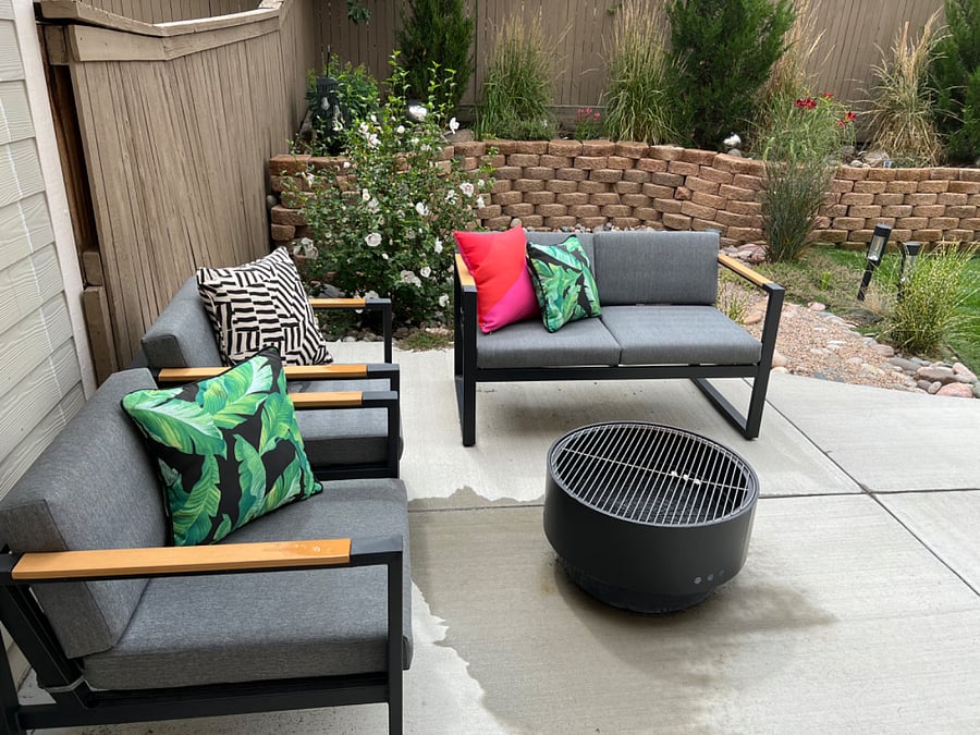 Quiet shared backyard with sitting and eating areas
