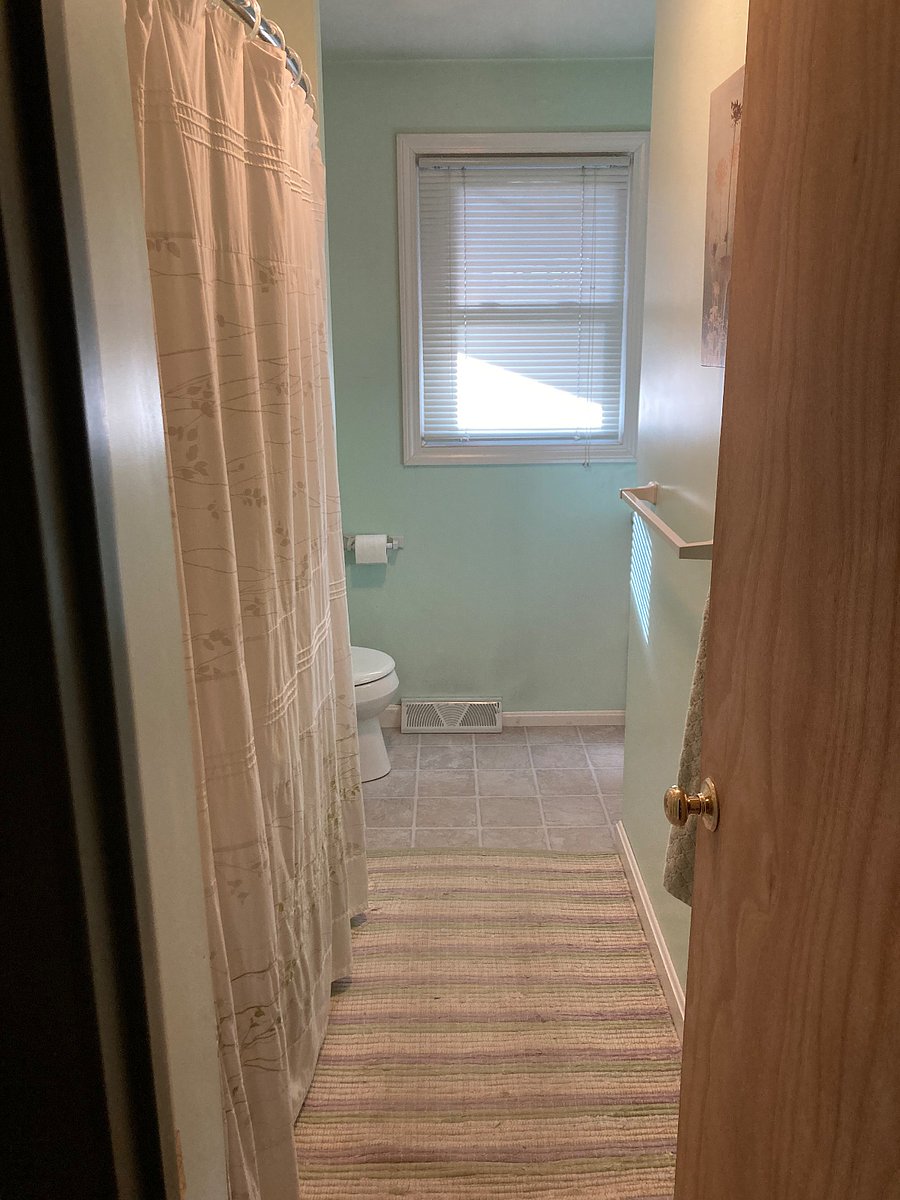 Full size shower/tub on left