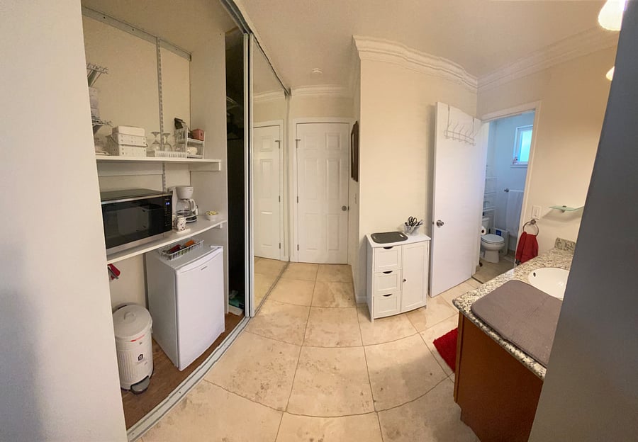 Kitchenette and bathroom to right side