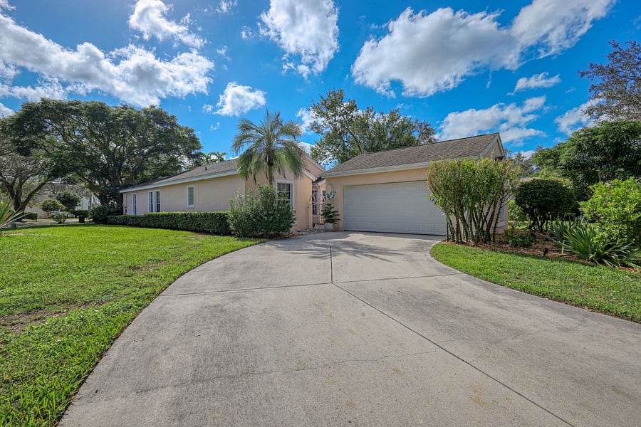 This residence is situated on a corner and while this is a very sleepy neighborhood having it tucked away is always nice. The driveway accommodates two cars easily and the two car garage is available for your usage.  The front of the home also has a large front lawn that is a dedicated leisure area for you and only you.:) . 