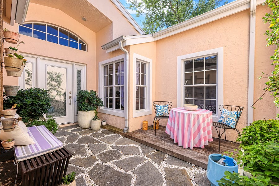 This residence is accessed via a front gate. This courtyard awaits on the other side of the gate. Each element was designed to enhance your well being. Carefully selected planting, pavers, stones, as well as the IPE deck were professionally curated.  
