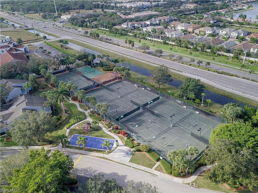 Pickle Ball and Tennis courts are lite in the evening. Shuffle board, bocce, a gazebo and and a children's play area round out the amenities within walking distance of the main pool and clubhouse