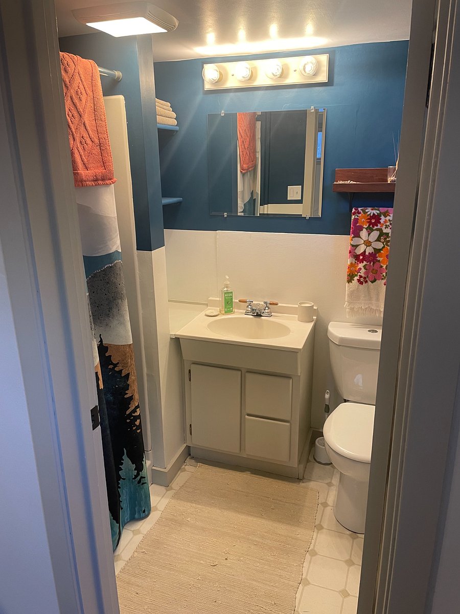 Bathroom, off of bedroom. Shower stall (no tub).