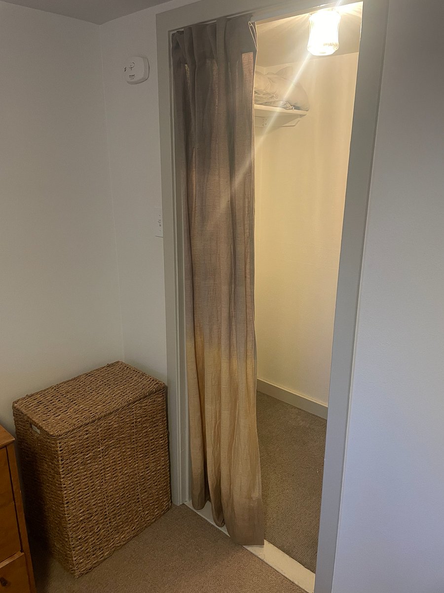 Walk-in closet in bedroom.