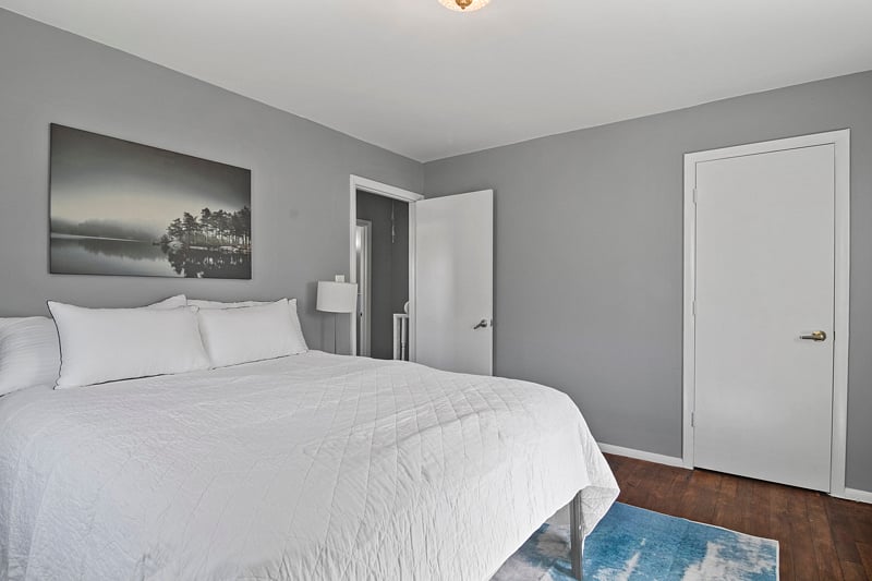 large upstairs room with queen bed