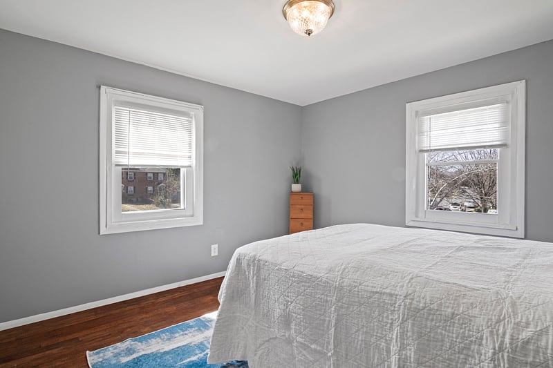 large upstairs room with queen bed