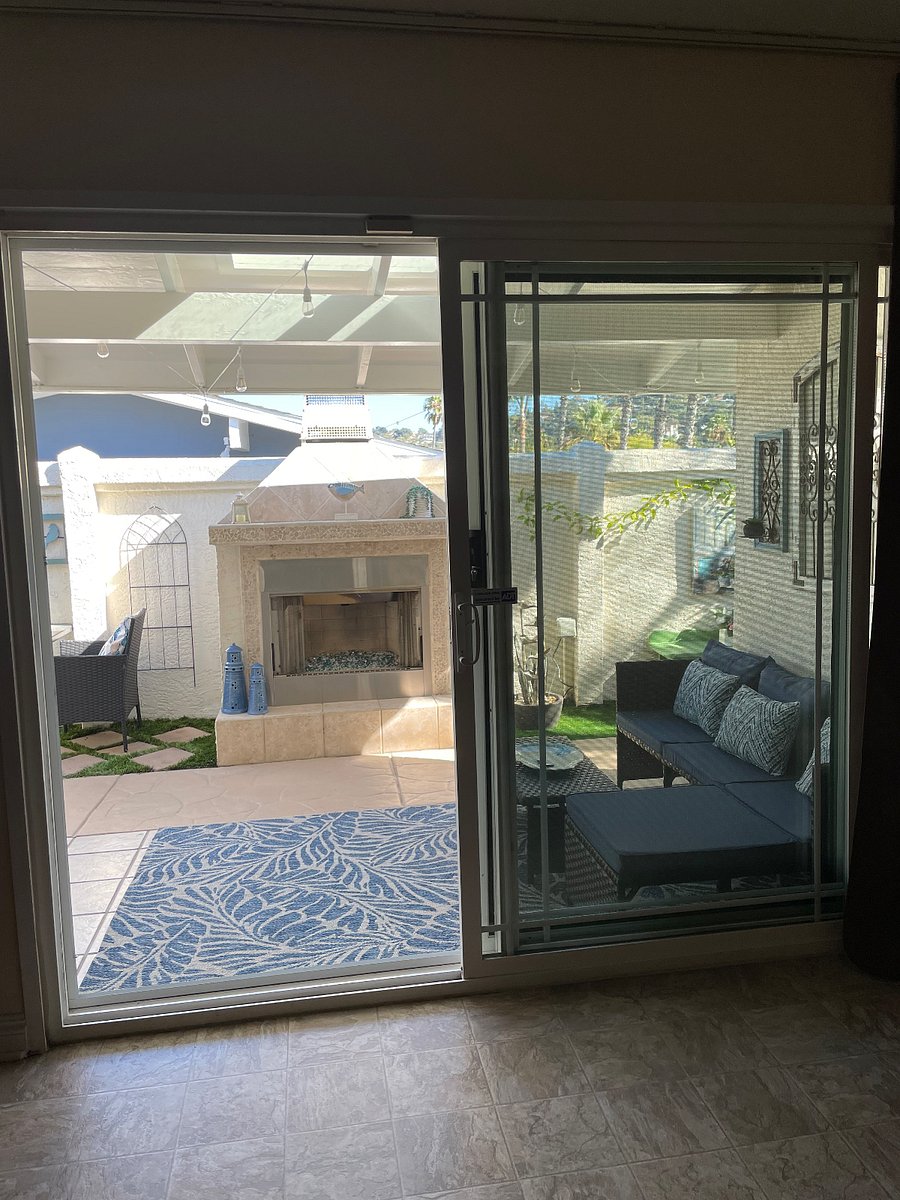 The view from inside your suite. Patio with skylight, and dimmable string lights. Full blackout curtains completely darken room for day sleepers.