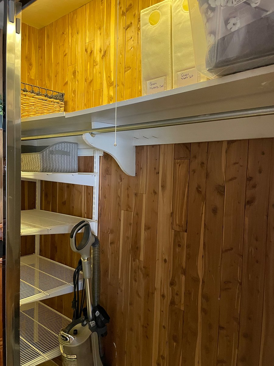 Full size cedar lined closet. Removable racks to add more hanging space if needed. Lots of storage on top.