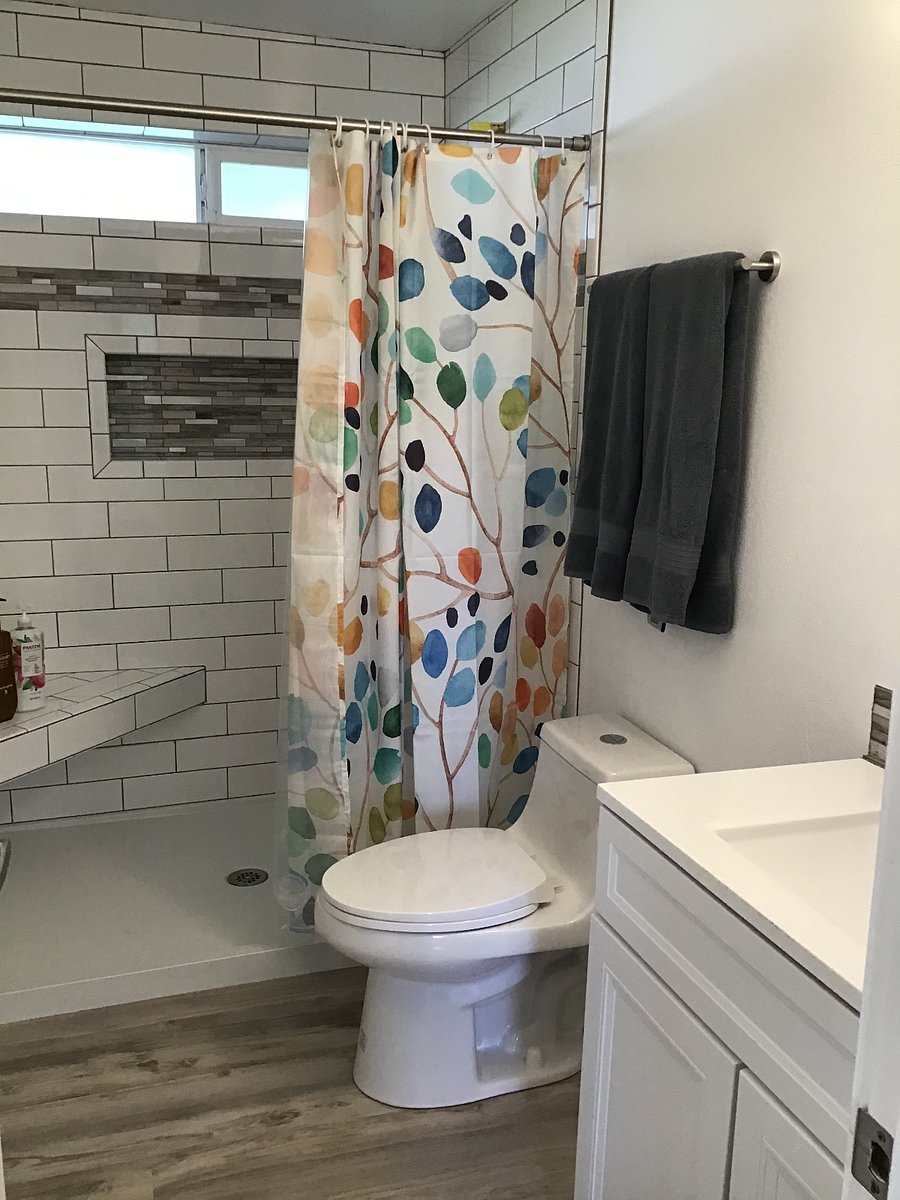 Upper-level bathroom with step-in shower.