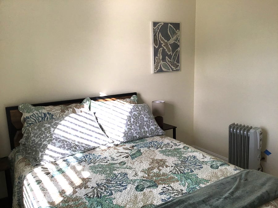 Bedroom #3 with full size bed and lots of natural light.