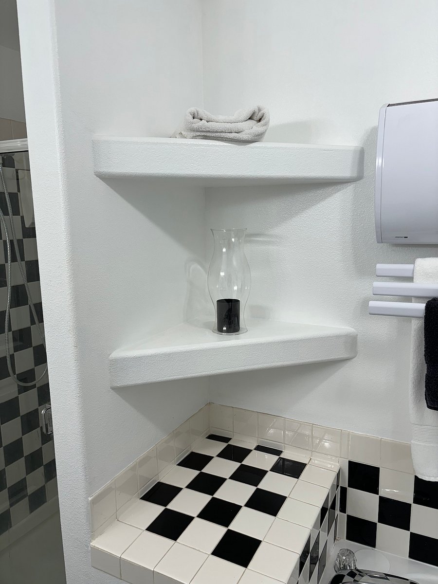 Space to put bathing and shower items, shampoo, conditioner, extra towels. 